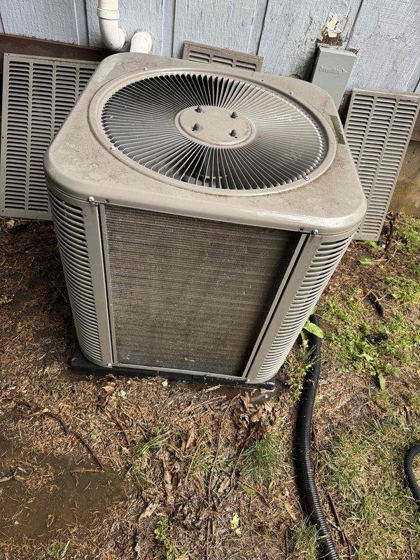 Responded to no cooling complaint on a three-year-old residential air conditioning system. Upon arrival, performed visual inspection of outdoor condenser unit and discovered heavily soiled air filter caked with dust, dirt, and debris restricting airflow to the system. Removed and documented the severely clogged filter which was causing reduced cooling capacity and inadequate temperature control throughout the home. The restricted airflow was preventing the system from operating at designed efficiency levels, resulting in the inability to maintain comfortable indoor temperatures. Cleaned accessible components and recommended filter replacement to restore proper system operation and airflow.