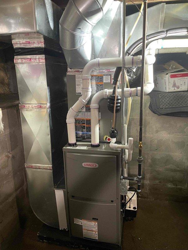 Completed full HVAC system installation including Lennox furnace and air conditioning unit. Installed all necessary ductwork with proper insulation, PVC condensate drain lines, and exterior venting configuration. Connected outdoor condenser unit with refrigerant lines, verified all electrical connections, and ensured system operational per manufacturer specifications.