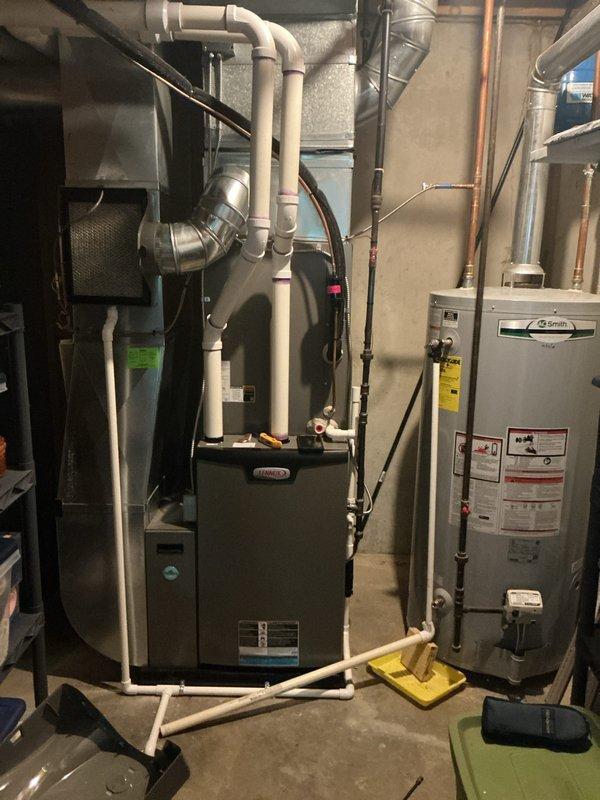 Completed annual HVAC maintenance on residential air handler system. Inspected furnace and air handler components, replaced air filter, and cleaned evaporator coil mesh screen. System operational with all components functioning within normal parameters.
