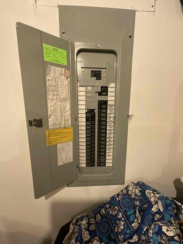 Conducted on-site evaluation for new mini split system installation. Assessed existing electrical panel capacity and available breaker space to determine compatibility with proposed mini split equipment. Documented current outdoor condenser location and evaluated potential placement options for new system components.