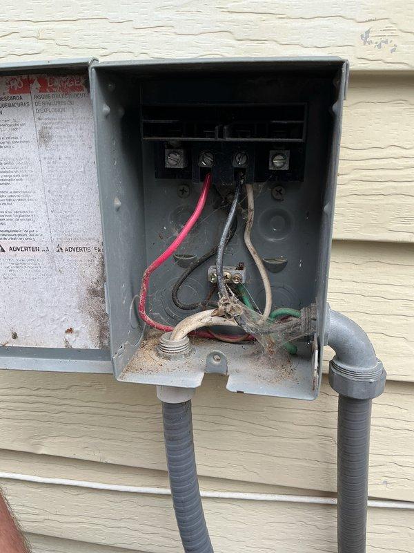 Responded to service call for 15-year-old central air conditioning system with reported compressor issues. Upon arrival, performed comprehensive inspection of outdoor condenser unit and electrical disconnect box. Inspected condenser unit exterior condition, fan assembly, and grille components. Opened and examined electrical disconnect enclosure, finding aged wiring connections with visible weathering and debris accumulation at terminals. Evaluated wire connections including line and load side terminals showing signs of outdoor exposure over time. Additionally performed requested furnace maintenance on 16-year-old heating system as customer requested combined service visit. System remained operational for both heating and cooling functions throughout service appointment.