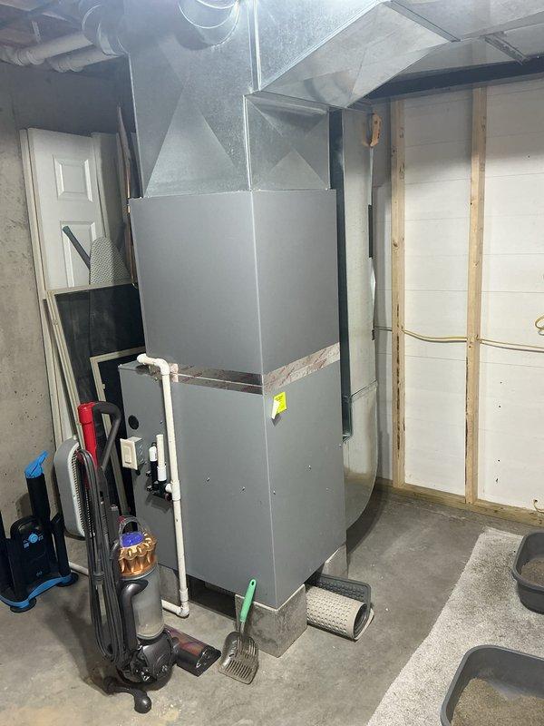 Completed annual AC tune-up on 15-year-old Concord system. Performed comprehensive maintenance inspection of air handler and furnace unit located in basement mechanical room, verified proper system operation, checked refrigerant levels, cleaned components, and inspected electrical connections. System is functioning properly with no issues identified.