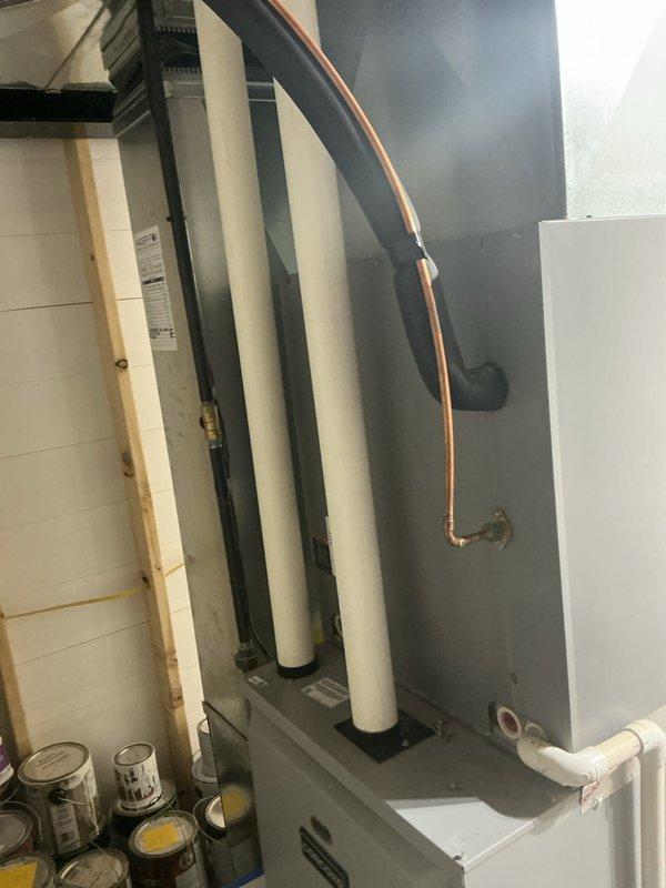 Completed annual AC tune-up on 15-year-old Concord system. Performed comprehensive maintenance inspection of air handler and furnace unit located in basement mechanical room, verified proper system operation, checked refrigerant levels, cleaned components, and inspected electrical connections. System is functioning properly with no issues identified.