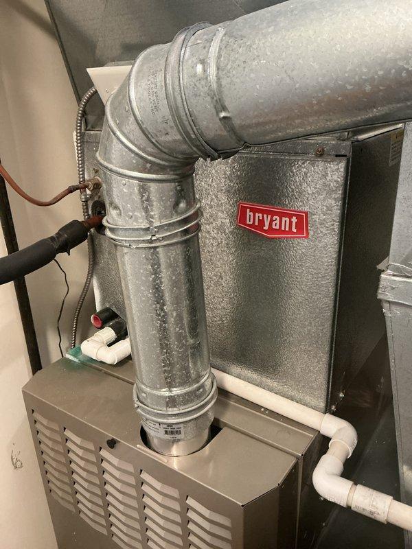 Completed scheduled air conditioning maintenance on Bryant HVAC system. Performed comprehensive inspection of air handler unit, verified proper operation of all components, and inspected ductwork showing condensation accumulation on galvanized supply plenum. Replaced air filters with new pleated media filters to maintain proper airflow and system efficiency.