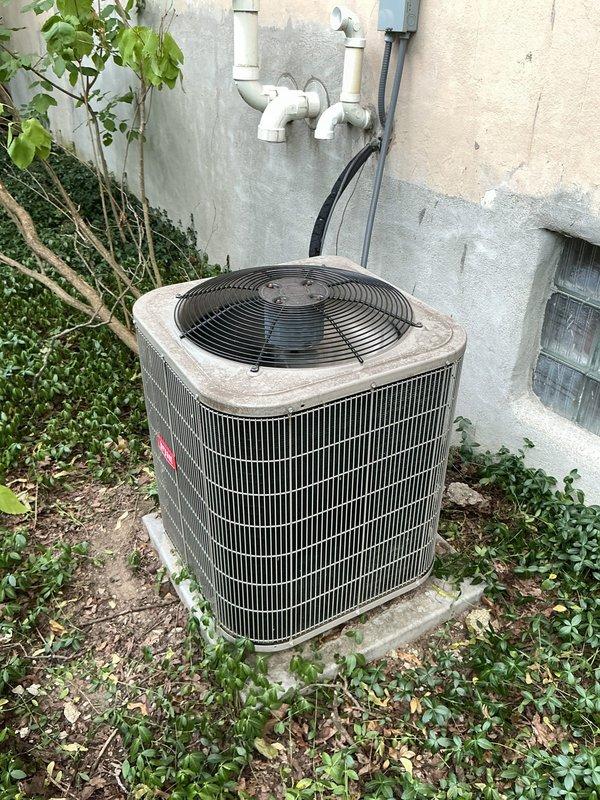 Performed maintenance on 15-year-old Bryant furnace and outdoor condenser unit. Addressed customer concern of no cooling, only fan operation. Removed stuck air filter and installed replacement filter. Inspected condensation pump which was found dry upon arrival. Completed full system maintenance including condenser coil cleaning and operational testing of both heating and cooling components.