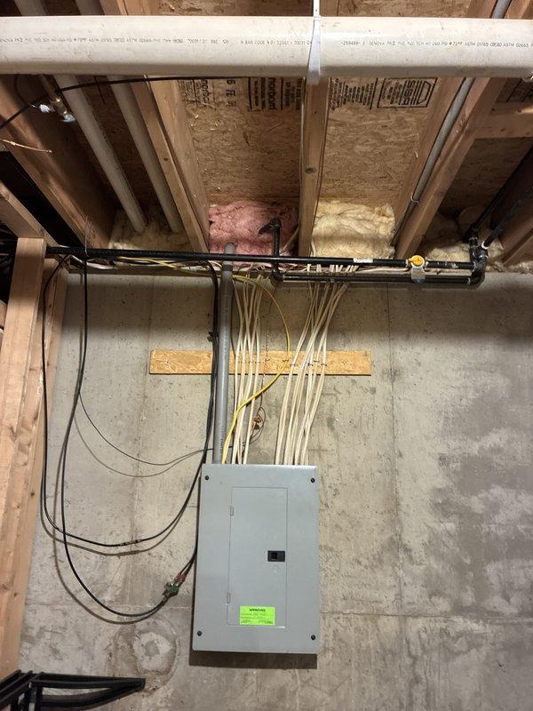 Completed electrical estimate for new whole home generator installation at a manufactured home. Assessed existing electrical infrastructure including main service panel located in basement utility area and exterior dual meter configuration with weathered utility connections. Provided comprehensive quote for generator installation requirements including necessary electrical upgrades, transfer switch integration, and proper load calculations to support whole home backup power system.