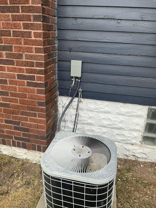Completed electrical service panel installation on residential property in coordination with utility work request and permit PE26-0802. Installed new meter base and service panel on exterior wall with appropriate conduit runs and HVAC disconnect, ensuring all work met code requirements for scheduled municipal electrical inspection.