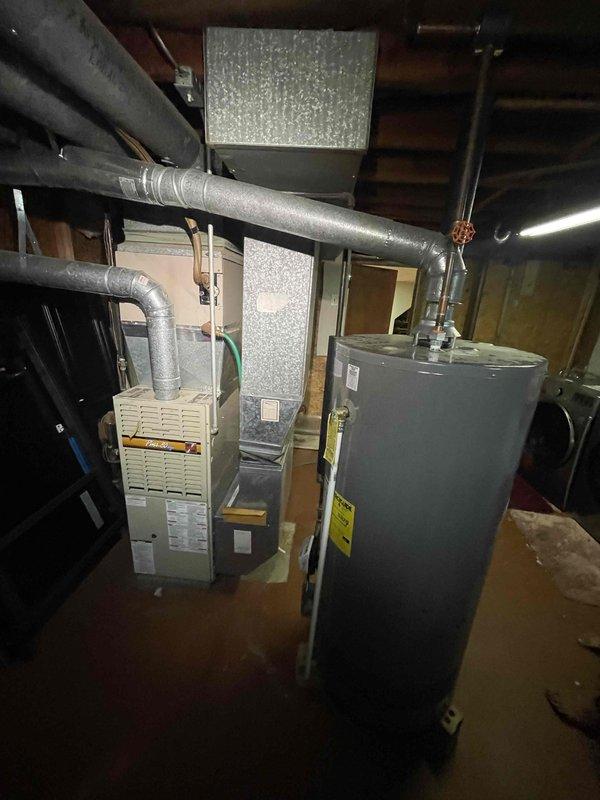 Conducted comprehensive full system estimate for residential HVAC replacement. Evaluated existing 15-year-old furnace and air conditioning unit in basement mechanical room, documenting equipment condition, ductwork configuration, and installation requirements through detailed photography. Customer requested immediate replacement of air conditioner unit; provided complete system assessment and replacement options for both heating and cooling equipment.