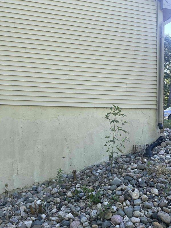 Responded to service call for 25-year-old air conditioning system not cooling when calling for it. Performed comprehensive system evaluation of backyard-located unit and assessed overall condition of aging equipment. Documented existing plumbing infrastructure, condensate drainage system, and outdoor unit installation. Provided full system replacement estimate due to equipment age and cooling failure.