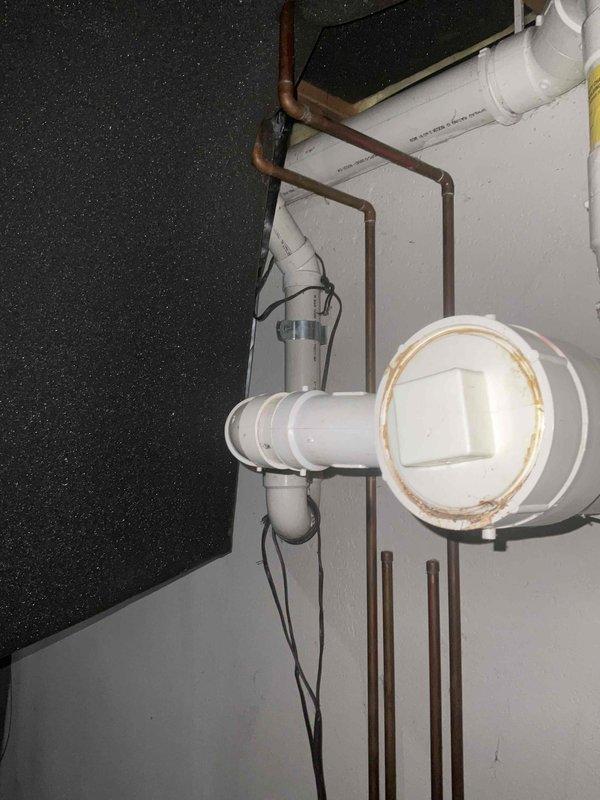 Responded to service call for 25-year-old air conditioning system not cooling when calling for it. Performed comprehensive system evaluation of backyard-located unit and assessed overall condition of aging equipment. Documented existing plumbing infrastructure, condensate drainage system, and outdoor unit installation. Provided full system replacement estimate due to equipment age and cooling failure.