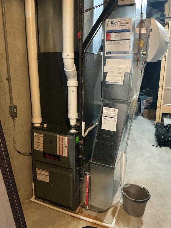 Completed annual HVAC maintenance tune-up on residential furnace and air handler system. Inspected 16x25x1 air filter, verified proper equipment operation, and confirmed all components functioning within normal parameters. System operational with no issues identified.