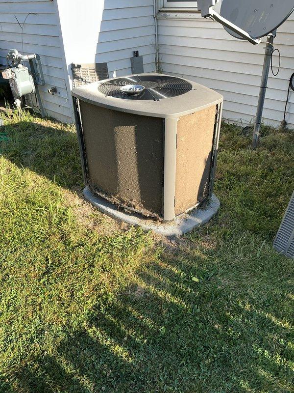 Completed annual HVAC maintenance on residential outdoor condensing unit. Performed comprehensive system inspection, verified refrigerant levels at service ports, checked electrical connections, and assessed overall equipment condition. Unit showing normal wear consistent with outdoor exposure but operating within acceptable parameters. Documentation photos captured for service records.
