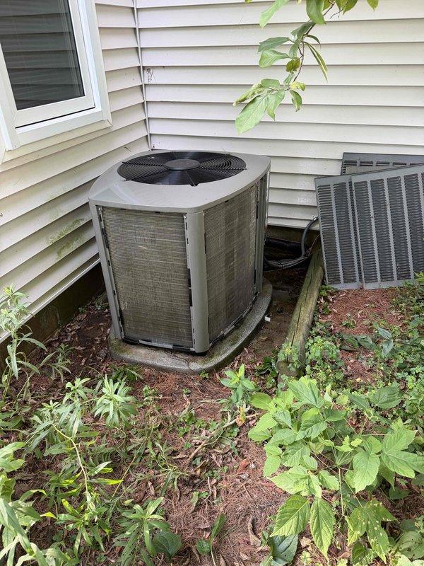 Completed comprehensive ComfortGuard 5-year maintenance visit on residential HVAC system and 20KW Kohler generator. Performed routine inspection and maintenance procedures on generator components including engine assembly, fuel system, electrical connections, and housing panels, verifying proper operation of all mechanical systems. Inspected outdoor air conditioning condenser unit and accompanying HVAC equipment, noting exterior weathering and vegetation encroachment around equipment pad requiring future attention for optimal airflow and system performance.