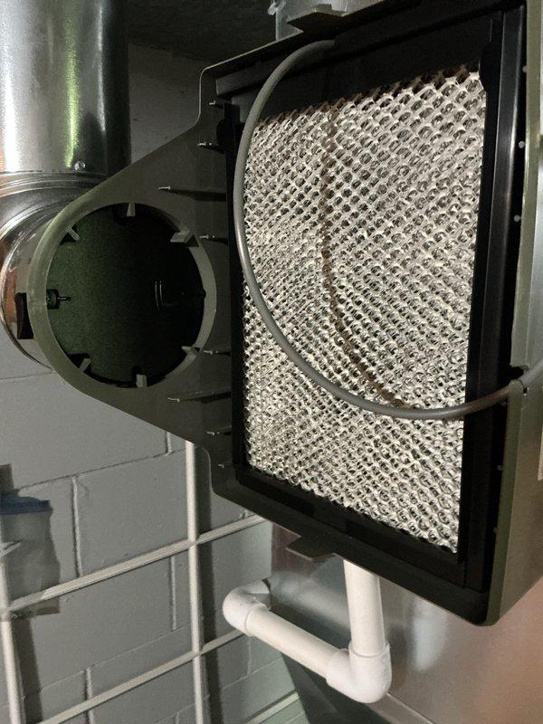 Completed scheduled Air Care Maintenance on HVAC system. Inspected air handling unit and filter assembly, documented condition of pleated air filters showing dust and debris accumulation, and verified proper operation of blower housing and ductwork connections. System components including condensate drain piping were examined and found to be functioning within normal parameters.