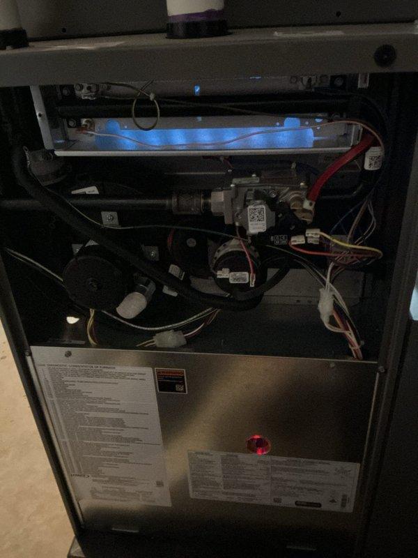 Completed comprehensive 5-year ComfortGuard maintenance inspection on residential gas furnace system. Performed thorough examination of all internal components including blower motor assembly, heat exchanger, gas valve, control board, and electrical connections. Verified proper operation of all safety controls, inspected wiring harnesses for wear or damage, and confirmed LED diagnostic indicators functioning correctly. All components found operating within normal parameters with no issues identified requiring immediate attention.