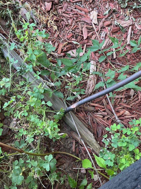 Responded to service call for refrigerant line damage caused by landscaping equipment on 10-15 year old outdoor condensing unit. Upon arrival, located severed refrigerant line in mulch bed area near equipment, confirmed complete system refrigerant loss. Repaired damaged line section, pressure tested system for leaks, evacuated system to remove moisture and contaminants, and recharged unit to manufacturer specifications, restoring cooling operation.