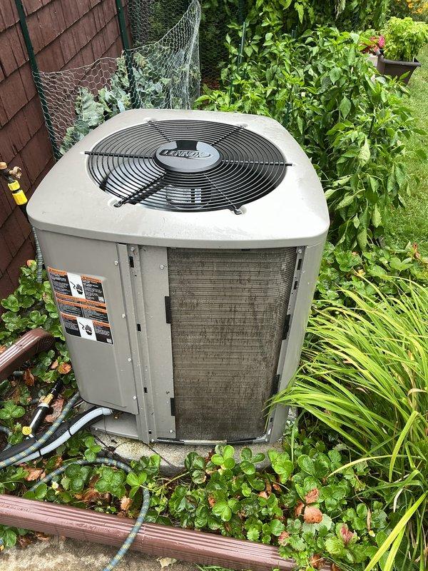 Completed seasonal maintenance tune-up on a Goodman air conditioning system installed in 2023. Performed comprehensive inspection of outdoor condenser unit, which showed good overall condition with proper operation and no visible signs of damage or deterioration. Verified system functionality, checked refrigerant lines, inspected electrical connections, and confirmed adequate airflow through clean condenser coils and fan assembly.