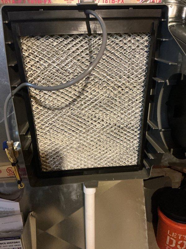 Completed routine air conditioning maintenance visit. Replaced heavily soiled air filter and humidifier pad as requested, both showing significant dust and debris accumulation. System inspected and serviced per standard ACM protocol, with all components found operating within normal parameters.
