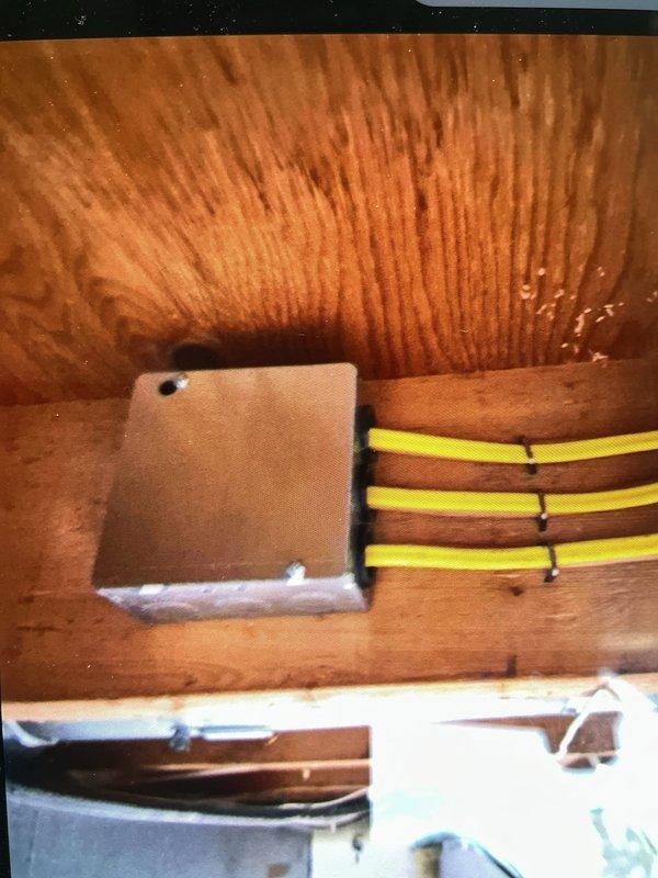 Installed new 15-amp circuit for living room outlets to address missing neutral condition. Replaced improperly supported junction boxes in basement that were hanging by romex cable, installed new properly secured junction boxes, and ran new romex between boxes through floor joists as existing wire was insufficient length. Corrected open ground condition by properly connecting ground wires at junction boxes.