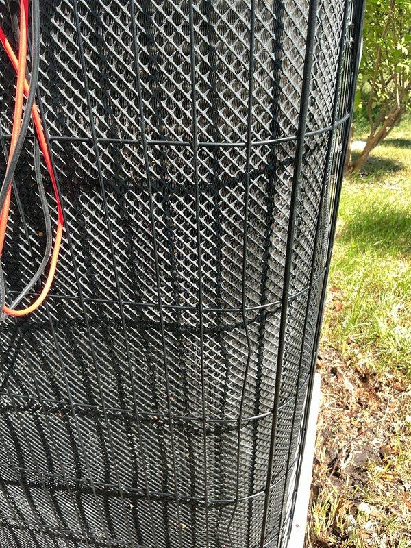 Completed annual cooling maintenance on residential outdoor condensing unit. Replaced air filter and evaporator pad as part of routine preventive maintenance service. Unit inspected and found to be operating within normal parameters with protective grilles intact and proper airflow maintained.