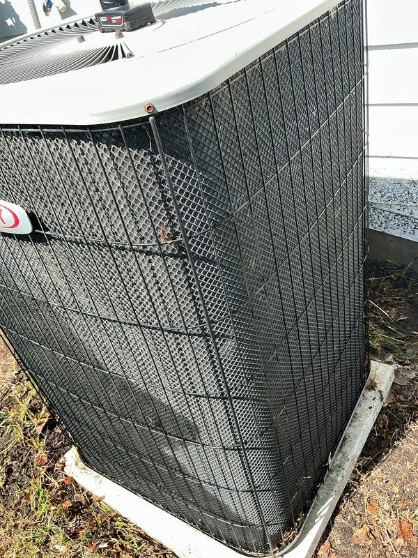 Completed annual cooling maintenance on residential outdoor condensing unit. Replaced air filter and evaporator pad as part of routine preventive maintenance service. Unit inspected and found to be operating within normal parameters with protective grilles intact and proper airflow maintained.