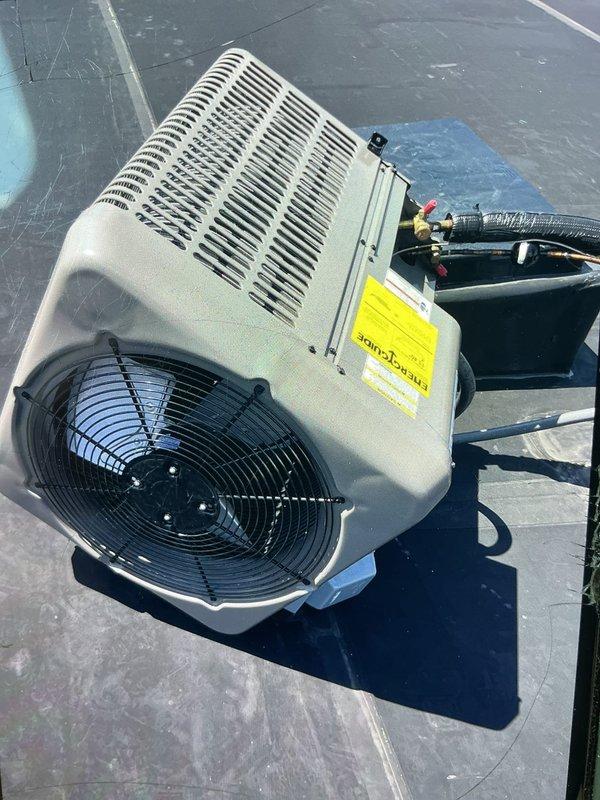 Responded to no-cool service call for 4-year-old rooftop AC unit that had tipped over and fallen off its platform. Upon arrival, found package unit displaced from mounting surface but still connected to electrical disconnect and ductwork. Assessed unit for structural and component damage, inspected condenser fan assembly, compressor mounting, and refrigerant lines for integrity. Repositioned unit onto rooftop platform, verified level placement, and secured equipment properly. Tested electrical connections at disconnect box, confirmed proper voltage supply, and checked all safety controls. Restored power to system and performed operational test to verify cooling function resumed normally with no refrigerant leaks detected.