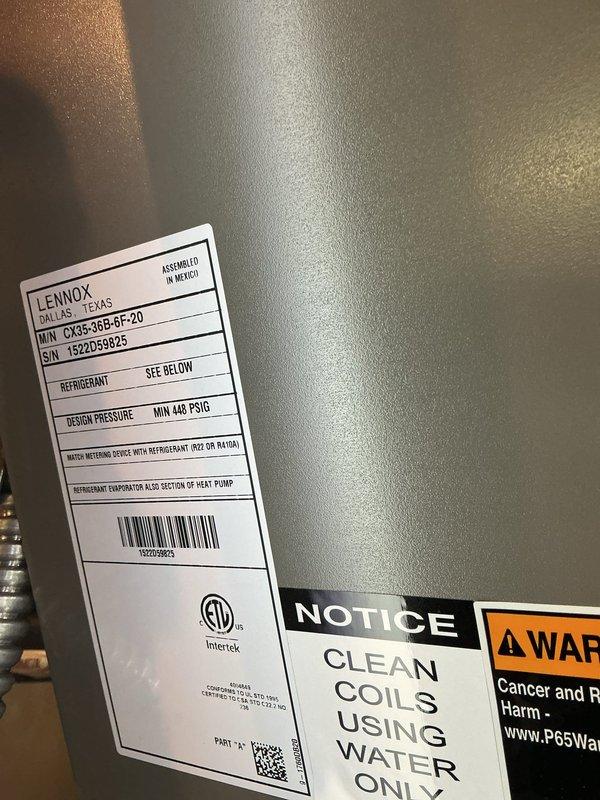 Performed air conditioning startup and inspection on Lennox condensing unit (Model SX35365-6F-20). Unit was successfully energized and operational following winter shutdown. Exterior cabinet showed significant dust and debris accumulation but unit functioned properly upon startup. Verified refrigerant specifications and safety labels present on equipment.