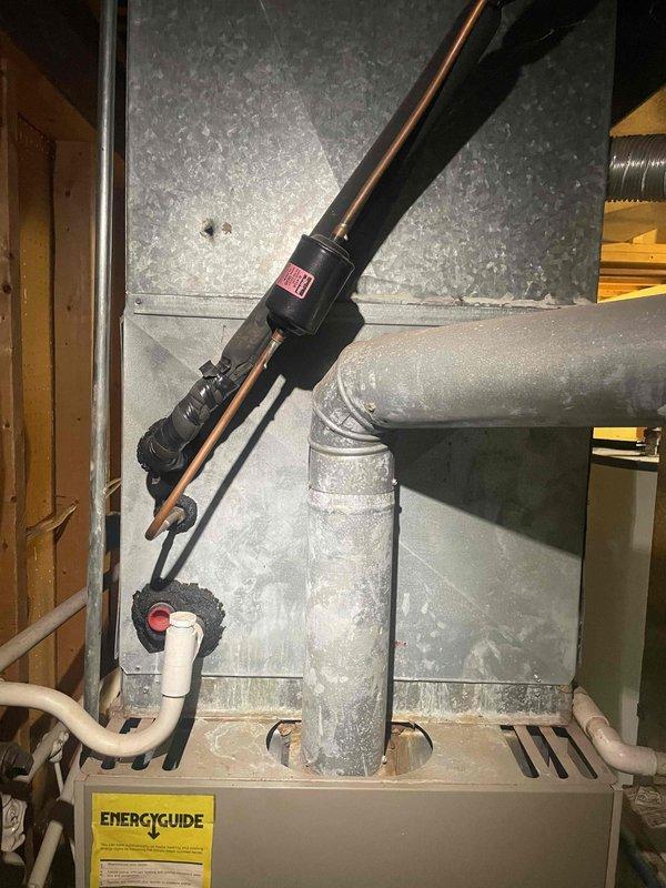 Provided comprehensive estimate for complete air conditioning system replacement in basement location with existing Ruud furnace. Current A/C unit is non-operational and requires full replacement with expedited installation timeline requested. Evaluated existing ductwork configuration, refrigerant line routing, condensate drainage system, and electrical connections to determine proper equipment sizing and installation requirements for new cooling system compatible with natural gas furnace setup.