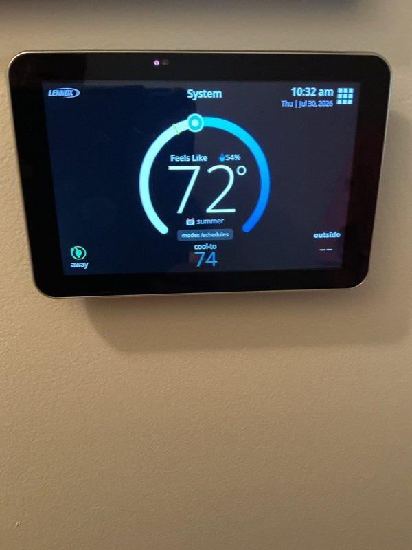 Completed comprehensive 5-year ComfortGuard maintenance on Lennox forced-air heating system. Performed full system inspection including furnace, ductwork, air filter housing, and digital thermostat operation. Investigated reported intermittent buzzing noise occurring during fan operation; inspected blower motor assembly, mounting hardware, and ductwork connections for loose components or vibration sources. Verified all PVC exhaust and intake vents properly secured, checked refrigerant line connections, and confirmed proper airflow through mesh filter housing. Tested thermostat functionality and system cycling; unit operating within normal parameters at time of service.