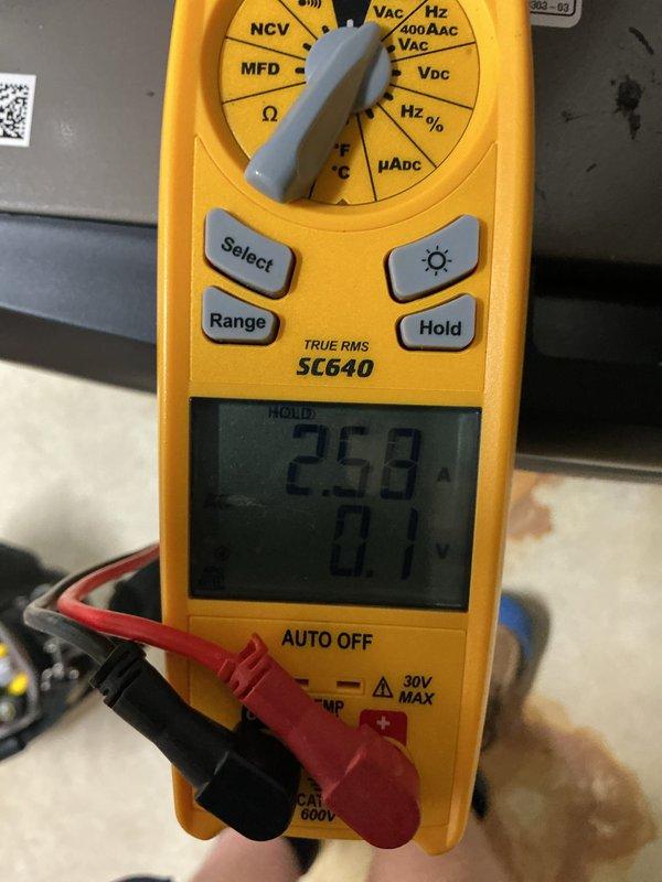 Completed annual preventive maintenance inspection on commercial refrigeration unit. During inspection, discovered severe corrosion throughout the evaporator coil assembly with extensive rust buildup on copper tubing and U-bends. Performed electrical diagnostics using digital multimeter to verify system operation and measured capacitance readings. Documented equipment condition with photographic evidence showing advanced deterioration of copper components and mineral deposits on fin assembly, recommending immediate coil replacement to prevent system failure.