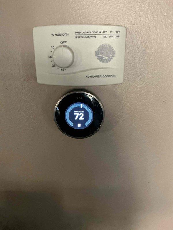 Completed annual cooling maintenance on residential HVAC system. Performed comprehensive inspection of air handler, ductwork, refrigerant lines, air filtration system, and climate control devices including Nest thermostat and humidifier control panel. All components found operating within normal parameters with no deficiencies identified.