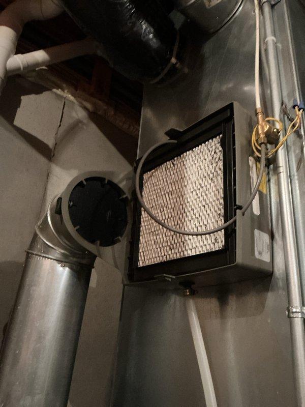Completed annual cooling maintenance on residential HVAC system. Performed comprehensive inspection of air handler, ductwork, refrigerant lines, air filtration system, and climate control devices including Nest thermostat and humidifier control panel. All components found operating within normal parameters with no deficiencies identified.