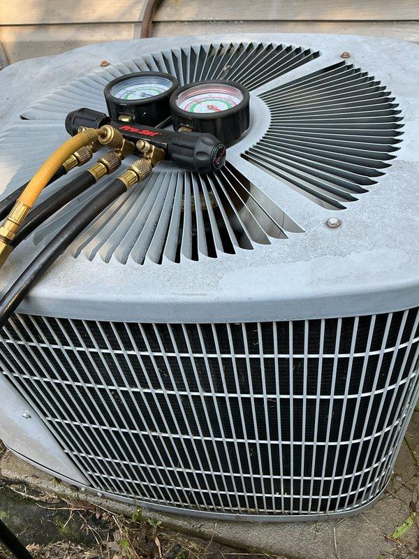 Completed routine air conditioning tune-up on Carrier model 38TKB024 outdoor condensing unit, serial number 2300E27097. Performed standard maintenance procedures including system performance evaluation, pressure testing with manifold gauges, refrigerant level verification, electrical component inspection, and condenser coil assessment. Unit operating within normal parameters with no deficiencies noted at time of service.