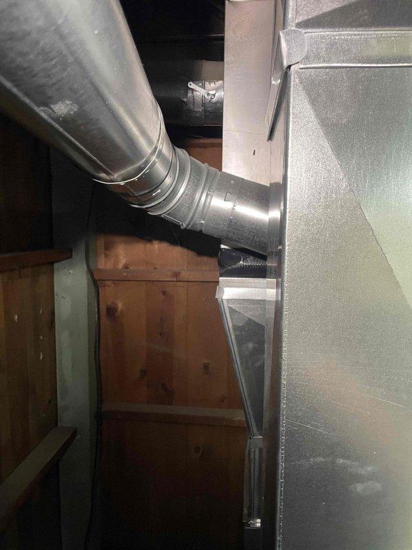 Performed comprehensive evaluation of existing furnace system and ductwork infrastructure to assess feasibility of adding central air conditioning to recently purchased home. Inspected furnace unit installed within last few years for potential water damage from previous basement flooding incident, verifying operational integrity and examining all components for moisture intrusion or corrosion. Evaluated existing plenum, supply ductwork, and trunk line configuration in basement and attic spaces to confirm AC-ready installation capability. Assessed electrical service capacity, refrigerant line routing pathways, condensate drain options, and outdoor condenser placement locations. Documented current HVAC system layout including flexible and rigid ductwork connections, air handler positioning, and structural framing considerations. Provided detailed estimate for complete air conditioning system addition including evaporator coil integration with existing furnace, outdoor condensing unit, re