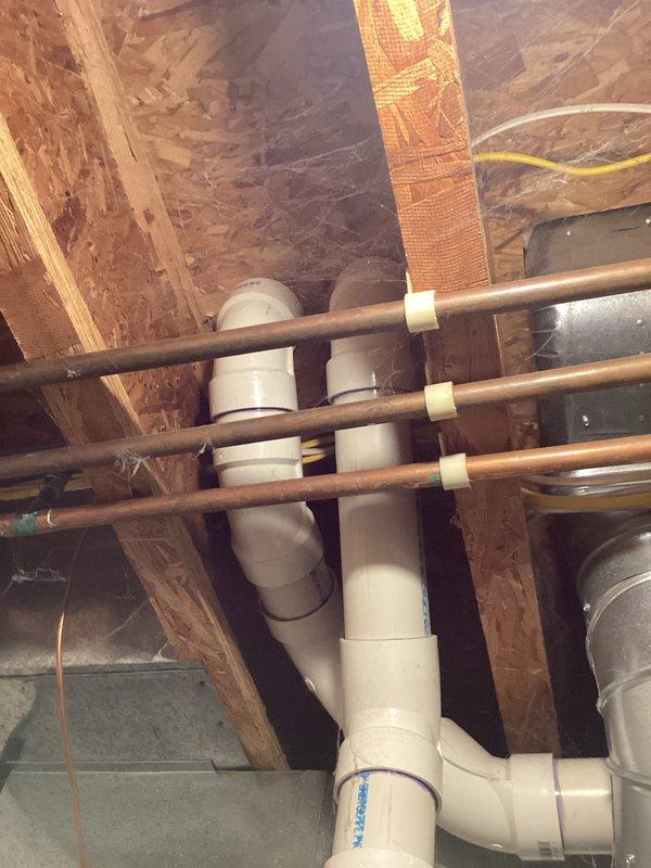 Completed full HVAC system installation including a 90,000 BTU Lennox furnace, 3-ton air conditioning unit with evaporator coil in rear discharge configuration. Installed complete PVC venting system for furnace exhaust and intake, routed copper refrigerant lines with proper support brackets, and connected metal supply ductwork. Performed all electrical connections, reconnected existing system components, and verified proper operation of heating and cooling functions.