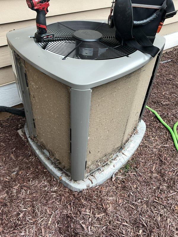Responded to no cooling call and performed diagnostic inspection of outdoor condensing unit. Upon arrival, conducted visual assessment and operational testing of the air conditioning system. Inspected condenser unit exterior, coil condition, and associated refrigerant lines and condensate drainage system. Unit showed normal outdoor weathering consistent with age but no visible signs of significant damage or corrosion to cabinet or coil surfaces. Completed troubleshooting procedures to identify root cause of system failure and determine appropriate repair recommendations.