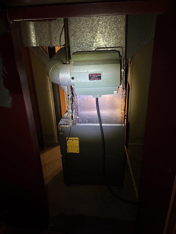 Provided comprehensive estimate for complete HVAC system replacement in basement including natural gas furnace, air conditioning unit, humidifier, and thermostat. Both existing 5-year-old furnace and AC unit are non-operational and require full replacement. Assessed current equipment configuration, ductwork connections, and installation requirements to determine appropriate system specifications for residential comfort system upgrade.