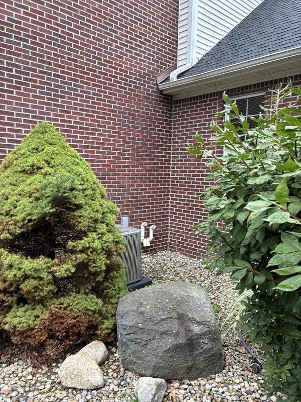 Provided comprehensive replacement estimate for 25+ year old air conditioning and natural gas furnace system located in basement. Current air conditioner is non-operational. Evaluated existing outdoor condensing unit installation against brick exterior with electrical disconnect and condensate drainage configuration, as well as interior furnace equipment to determine appropriate replacement specifications and system requirements.