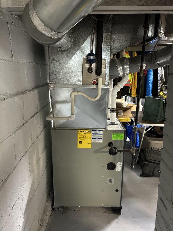 Provided estimate for air conditioning system replacement in residential basement installation. Current A/C unit is non-operational and requires full replacement. Assessed existing HVAC setup including furnace configuration and available space for new equipment installation, documented equipment specifications and installation requirements for competitive proposal.