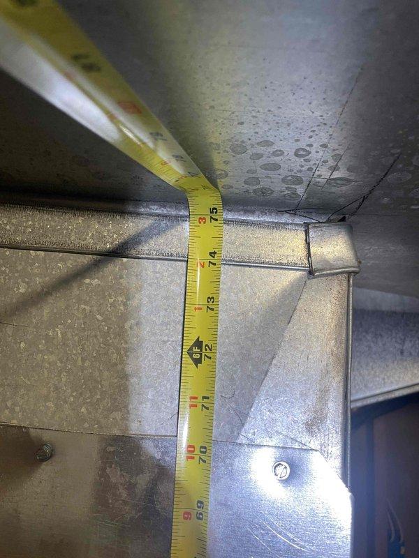 Provided estimate for furnace replacement in basement. Current 13-year-old unit is non-operational. Documented existing ductwork configuration and clearance measurements for new equipment installation.
