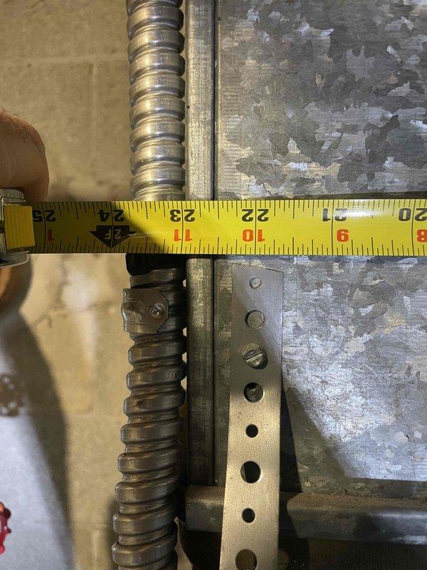 Conducted on-site evaluation for cooling system replacement of approximately 20-year-old Bryant air conditioning unit. Documented existing HVAC infrastructure including ductwork configuration, mounting hardware, and clearance measurements in mechanical room. Provided replacement system estimate for installation scheduled in upcoming year.