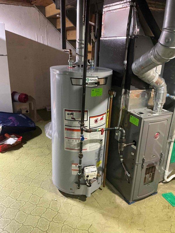 Responded to service call for reported carbon monoxide leak from Rheem furnace located in basement. Performed comprehensive safety inspection and combustion analysis of heating system. Upon thorough examination of furnace, heat exchanger, flue pipe connections, and venting system, found no evidence of active carbon monoxide leak or compromised heat exchanger integrity. Verified proper draft and venting operation, confirmed all gas connections were secure, and tested combustion efficiency parameters within acceptable ranges. Advised customer that system appeared to be operating safely at time of inspection, though age of equipment is unknown and continued monitoring is recommended.