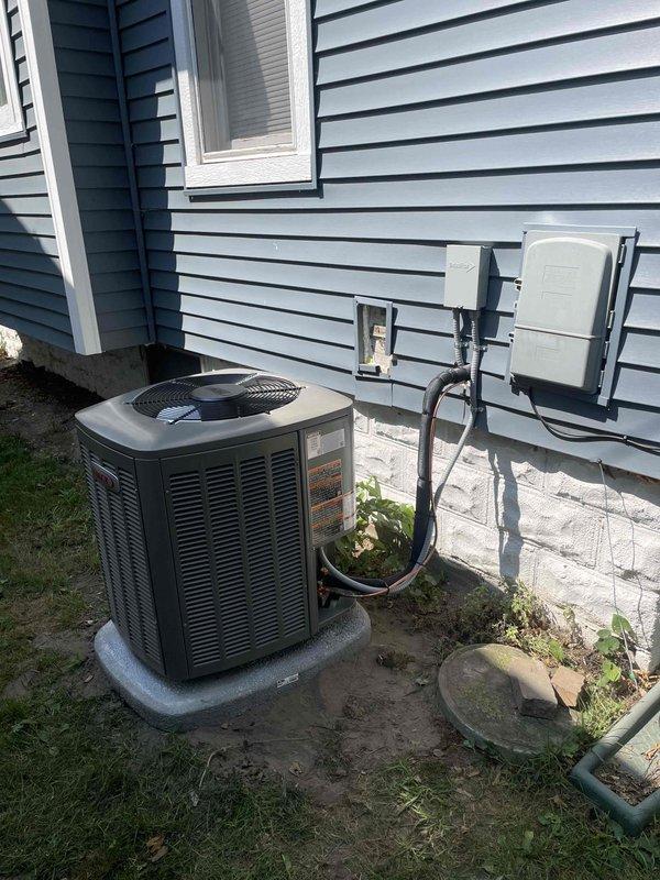 Successfully completed full HVAC system installation including new air conditioning condensing unit and evaporator coil. Installed outdoor condensing unit on concrete pad at side of residence with proper clearances, ran refrigerant lines with black insulation up exterior wall, and mounted electrical disconnect boxes per code requirements. Connected all electrical and refrigerant lines, pressure tested system for leaks, evacuated lines, and charged system to manufacturer specifications. Verified proper airflow, tested all safety controls, and confirmed system operational with correct temperature differential across coil.