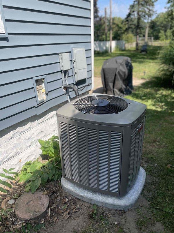 Successfully completed full HVAC system installation including new air conditioning condensing unit and evaporator coil. Installed outdoor condensing unit on concrete pad at side of residence with proper clearances, ran refrigerant lines with black insulation up exterior wall, and mounted electrical disconnect boxes per code requirements. Connected all electrical and refrigerant lines, pressure tested system for leaks, evacuated lines, and charged system to manufacturer specifications. Verified proper airflow, tested all safety controls, and confirmed system operational with correct temperature differential across coil.
