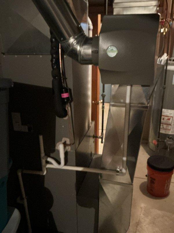 Completed comprehensive 5-year ComfortGuard Maintenance visit on residential HVAC system. Inspected and serviced Lennox furnace/air handler unit with associated ductwork, refrigerant lines, and condensate drainage system. Verified Lennox digital thermostat operation showing proper cooling function at 73°F setpoint with system maintaining comfort levels and accurate outdoor temperature readings of 79°F.