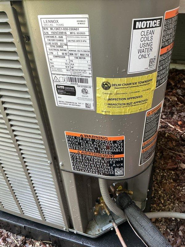Completed annual cooling maintenance on Lennox ML13XC1-030-230A01 outdoor condensing unit. Inspected unit exterior, verified manufacturer labels and specifications, checked refrigerant line connections and insulation integrity, and cleaned condenser coils per manufacturer guidelines. Unit operating within normal parameters upon completion of preventive maintenance service.