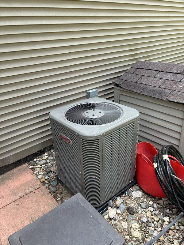 Completed estimate for full HVAC system replacement including new furnace installation scheduled for August. Existing Bryant air conditioning condenser unit from 2020 installation currently operational and positioned on concrete pad with proper drainage. Documented current system configuration with electrical disconnect box and conduit routing for future reference during upcoming furnace replacement work.