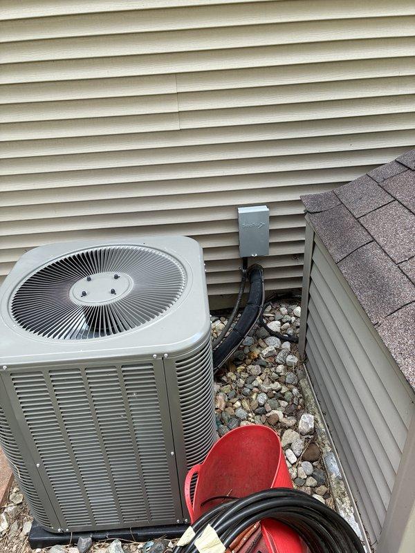Completed estimate for full HVAC system replacement including new furnace installation scheduled for August. Existing Bryant air conditioning condenser unit from 2020 installation currently operational and positioned on concrete pad with proper drainage. Documented current system configuration with electrical disconnect box and conduit routing for future reference during upcoming furnace replacement work.