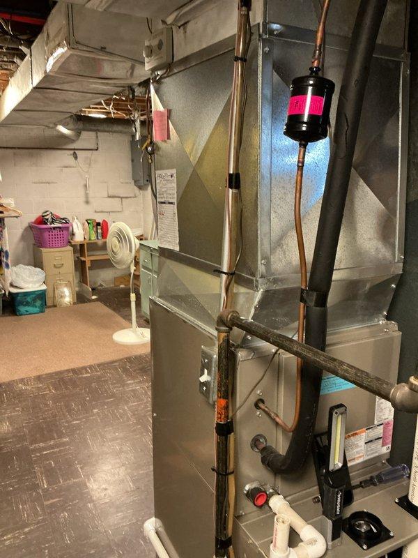 Completed annual HVAC maintenance on residential air handler system. Performed comprehensive inspection of equipment, replaced air filters, examined electrical connections and wiring compartment, and verified proper operation of all components including refrigerant lines, capacitor, and condensate drainage system.