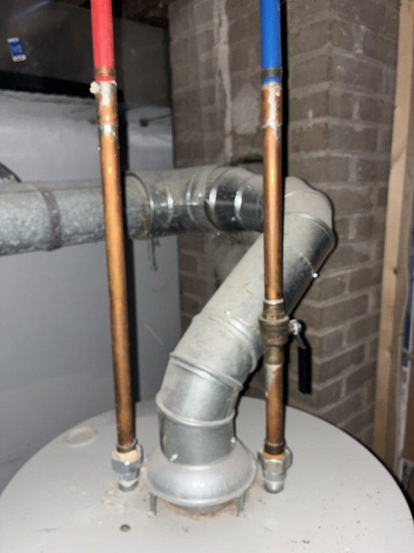 Performed full system estimate for complete HVAC replacement on 16-year-old furnace and 15-year-old air conditioning system. Identified cracked heat exchanger in furnace posing carbon monoxide hazard, requiring immediate replacement to ensure safe operation. Evaluated existing AC unit nearing end of service life and recommended concurrent replacement for optimal system efficiency and compatibility. Documented current equipment conditions through photographs showing furnace installation, ductwork connections, and overall system configuration in basement utility area. Provided comprehensive replacement options with available financing solutions to address urgent safety concern while meeting budget constraints.